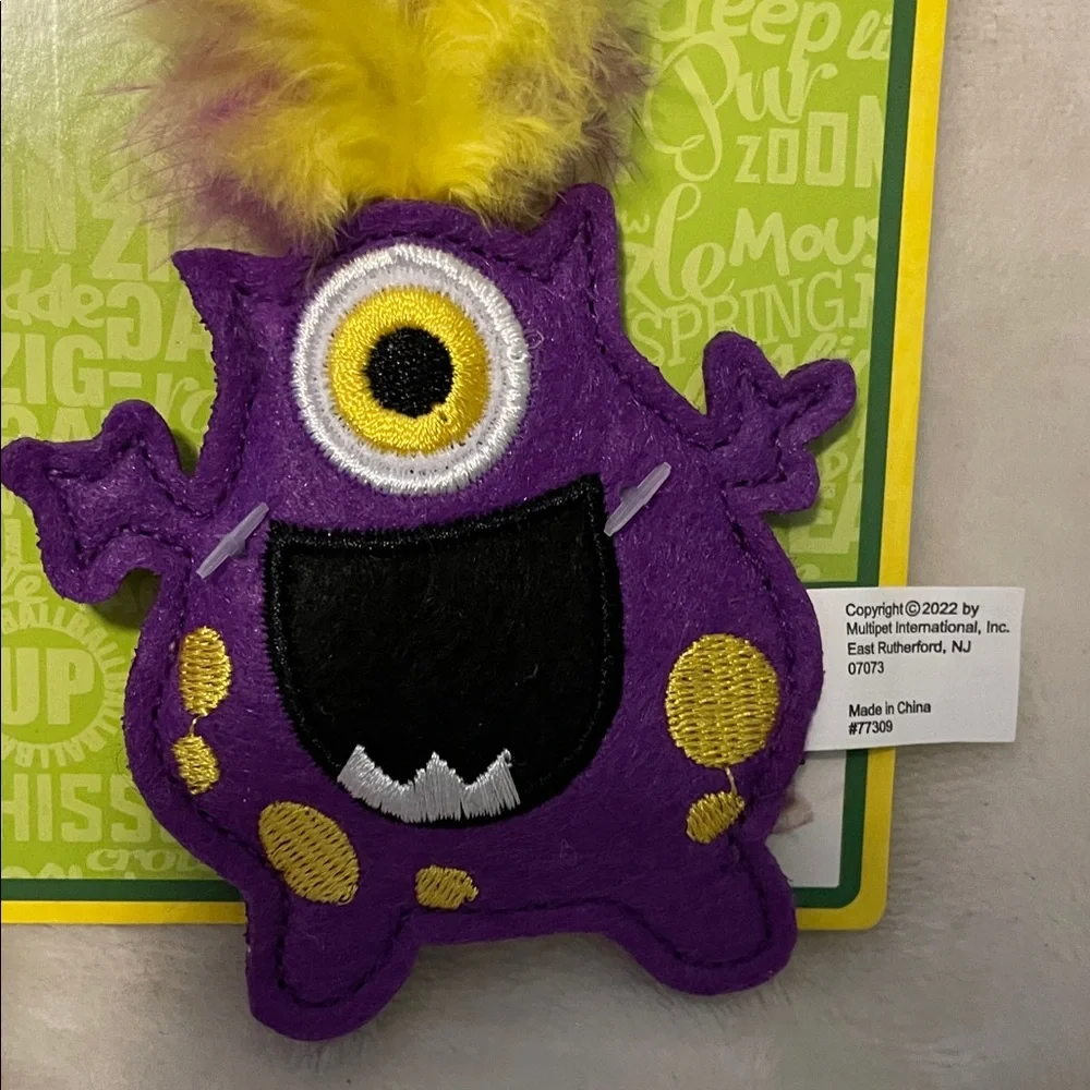 Multipet Purple Monster Cat Toy with Yellow Feathers